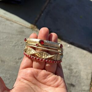 Lia Sophia gold with red gem stacking bracelets